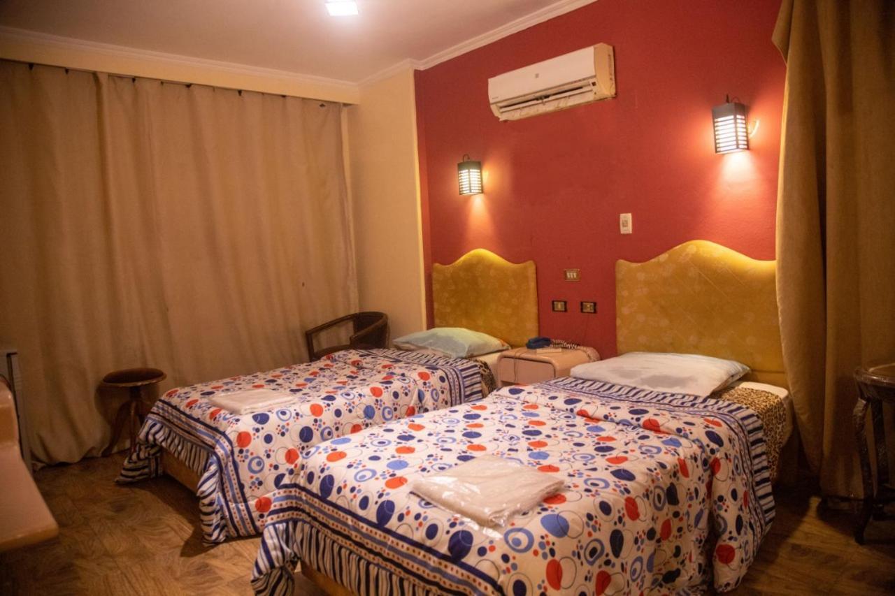Oasis Hotel Heliopolis Kairo Zimmer foto